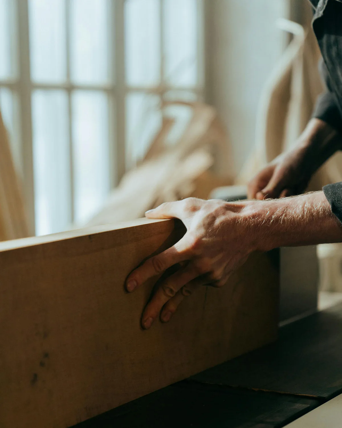 Close-up of detailed finish carpentry with precise trim and built-in woodwork.
