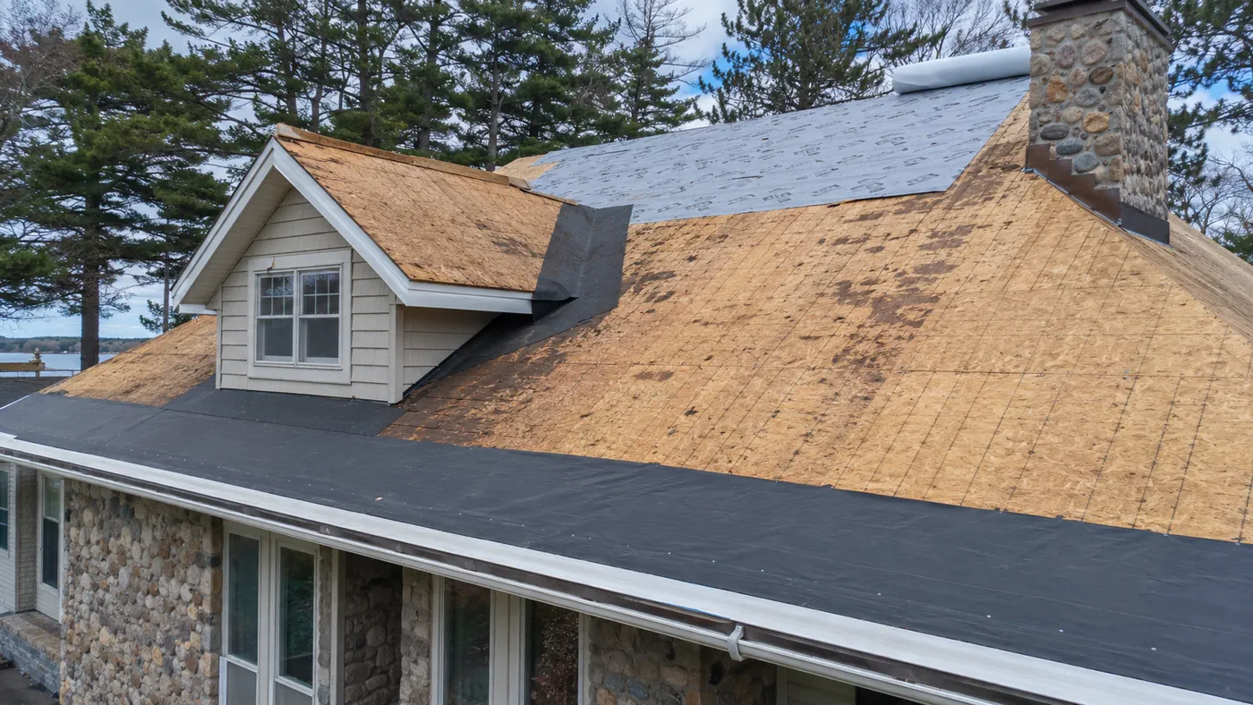 PVC membrane installed on a low-slope roof section of a Wisconsin home
