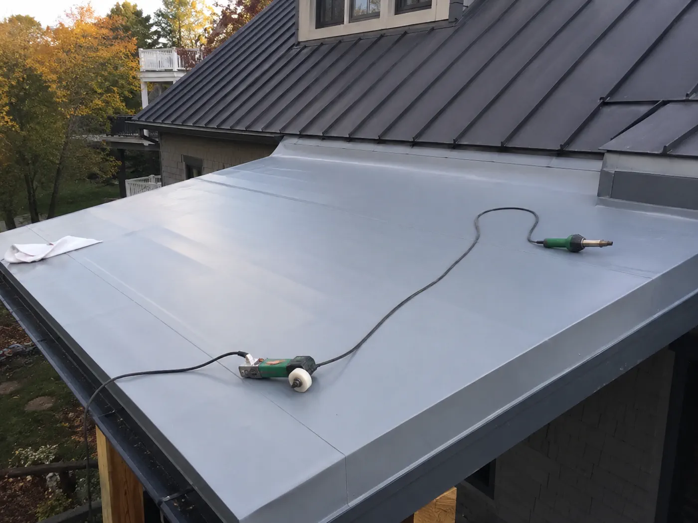 Roof pipe boot flashing detail on asphalt shingles during a Wisconsin roof inspection